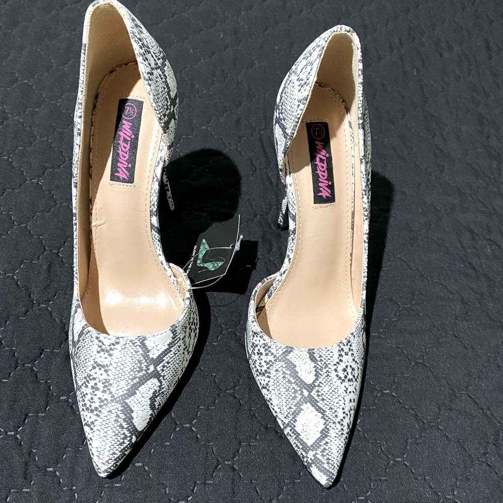 Wild diva snake pattern heels.